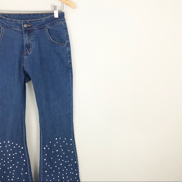 jeans with pearls on the bottom